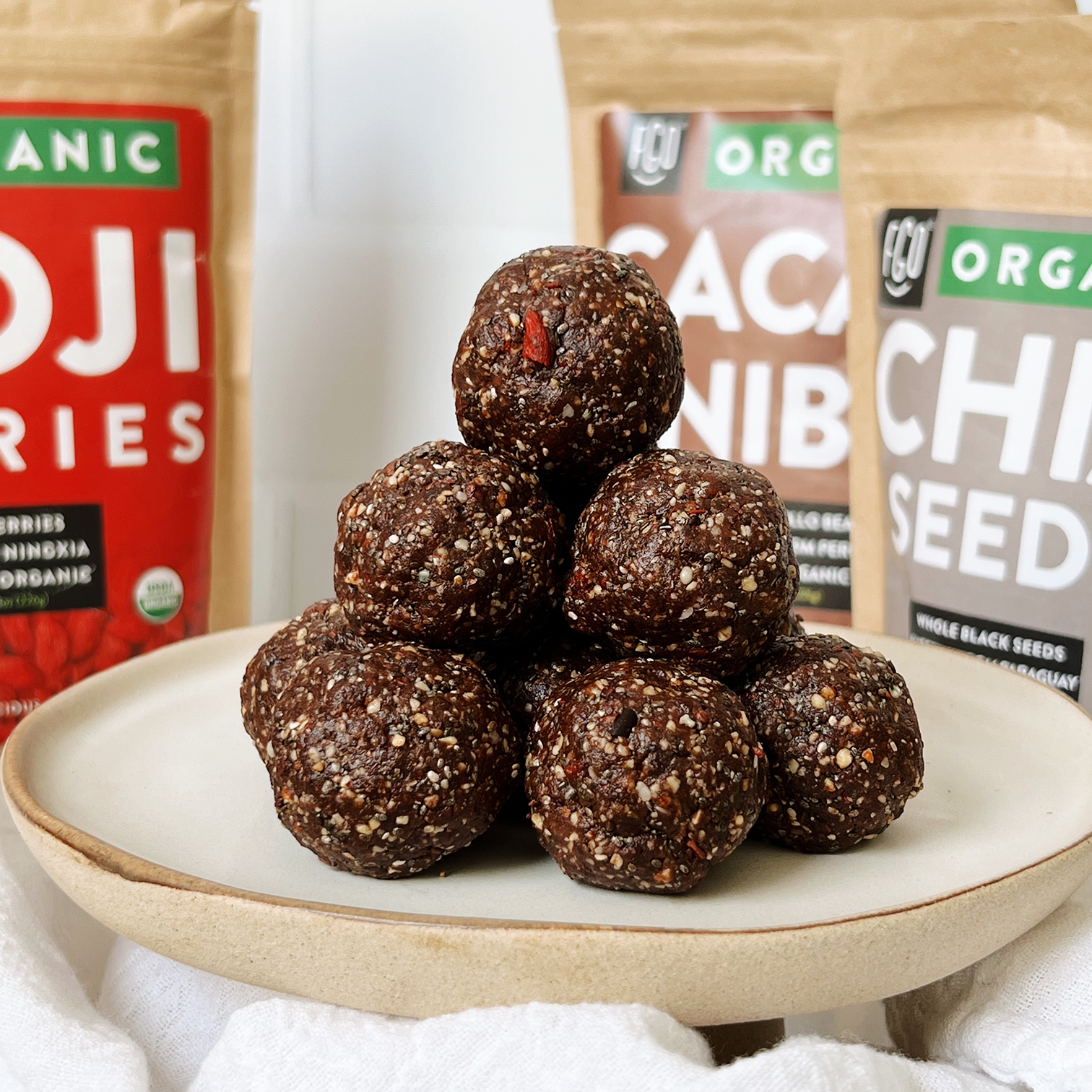 Superfood power bite balls stacked in a pyramid on a plate