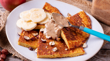baobab pancakes topped with banana and peanut butter