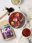 Acai bowl made with freeze-dried acai topped with goji berries, hemp seeds, chia seeds, and fresh berries.
