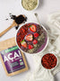 Acai bowl made with freeze-dried acai topped with goji berries, hemp seeds, chia seeds, and fresh berries.