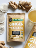 Fresh ginger root and hot ginger tea in a mug.