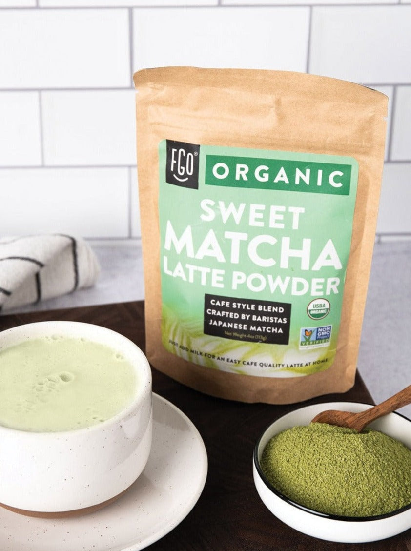 A hot frothy matcha latte made with sweet matcha latte powder.