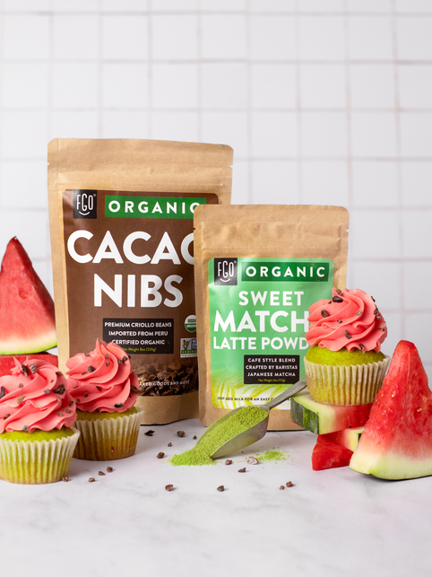 Raw ingredients for sweet watermelon cupcakes: matcha latte powder and cacao nibs.