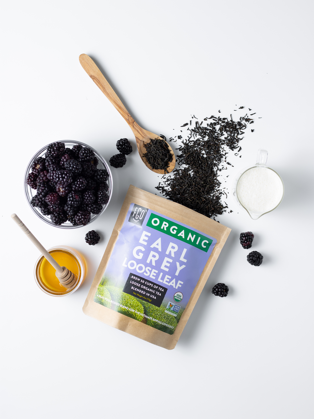 Raw ingredients in a blackberry earl grey tea with honey.