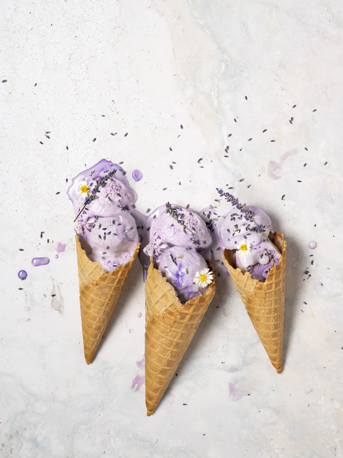Lavender earl grey ice cream waffle cones melting on the counter.