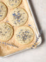 Lavender earl grey sugar cookies on a baking tray.