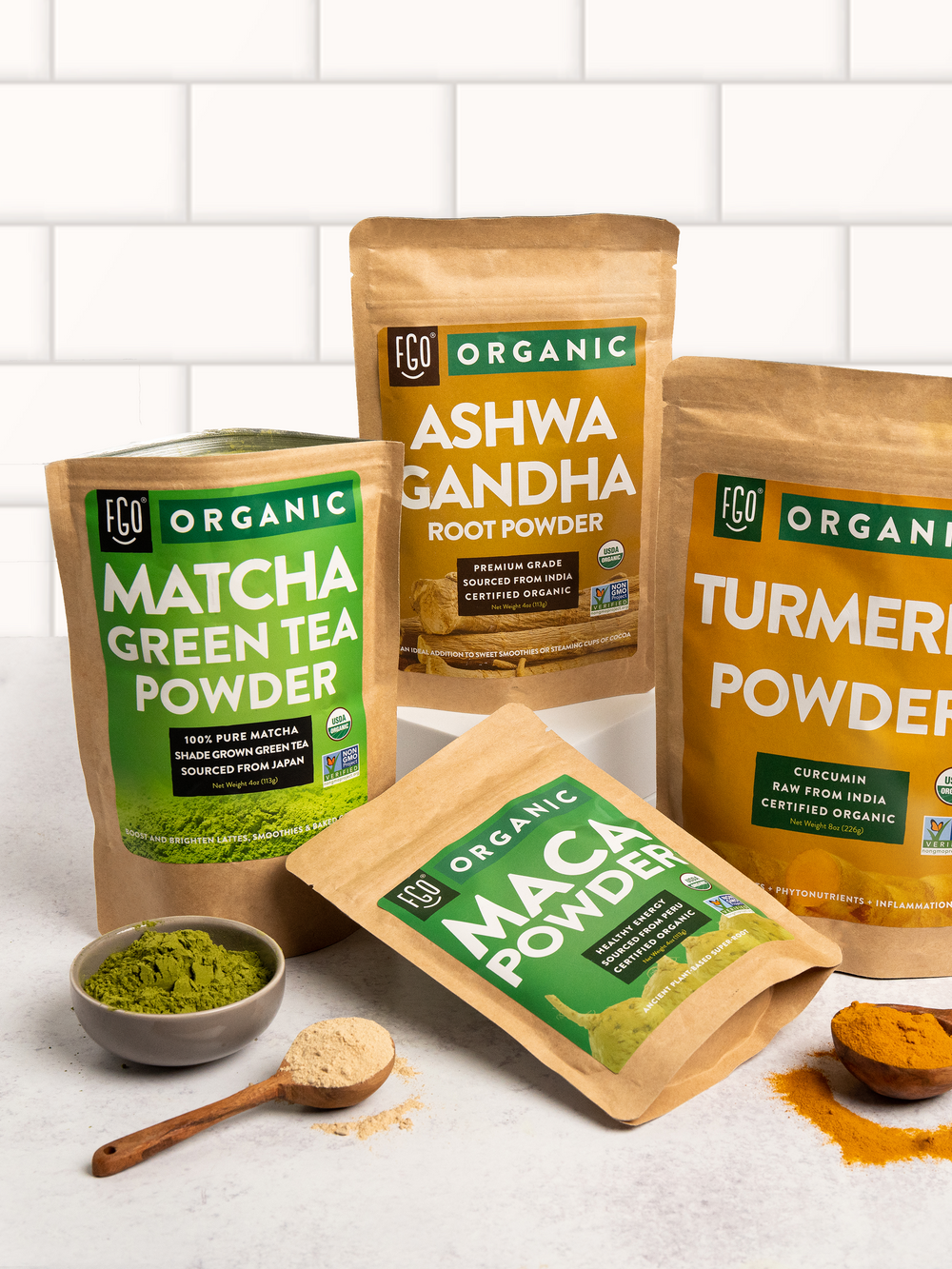Maca powder in wooden spoon.