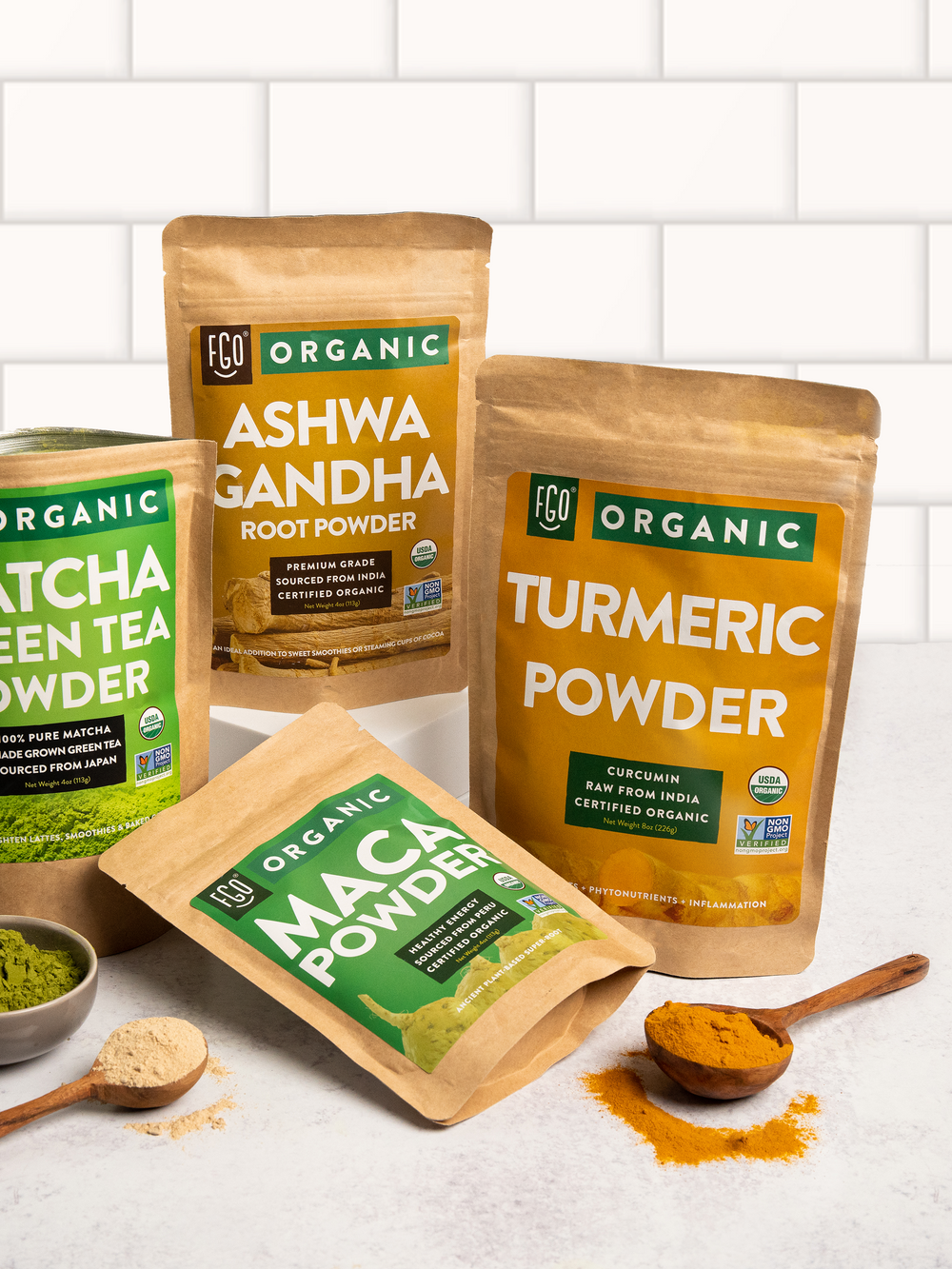 Raw turmeric powder in a wooden spoon.
