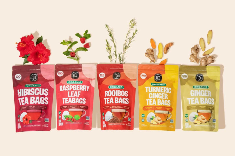 Five From Great Origins tea bag packs in a row, each with its botanical